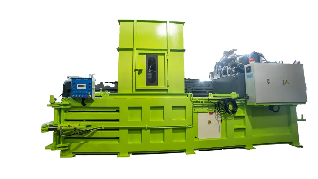 The equipment shown in the image is a horizontal fully automatic hydraulic baler, typically used for compressing and packaging materials. This kind of machinery is crucial in waste management and recycling facilities, as it can handle large volumes of materials such as paper, cardboard, plastic, and even metal scraps. The bright green color of the machine makes it visually distinctive, and its substantial size indicates that it is intended for heavy industrial use. The digital control panel and various hoses and cables suggest advanced functionality for automated operation and maintenance, improving efficiency and safety in handling recyclable and waste materials.