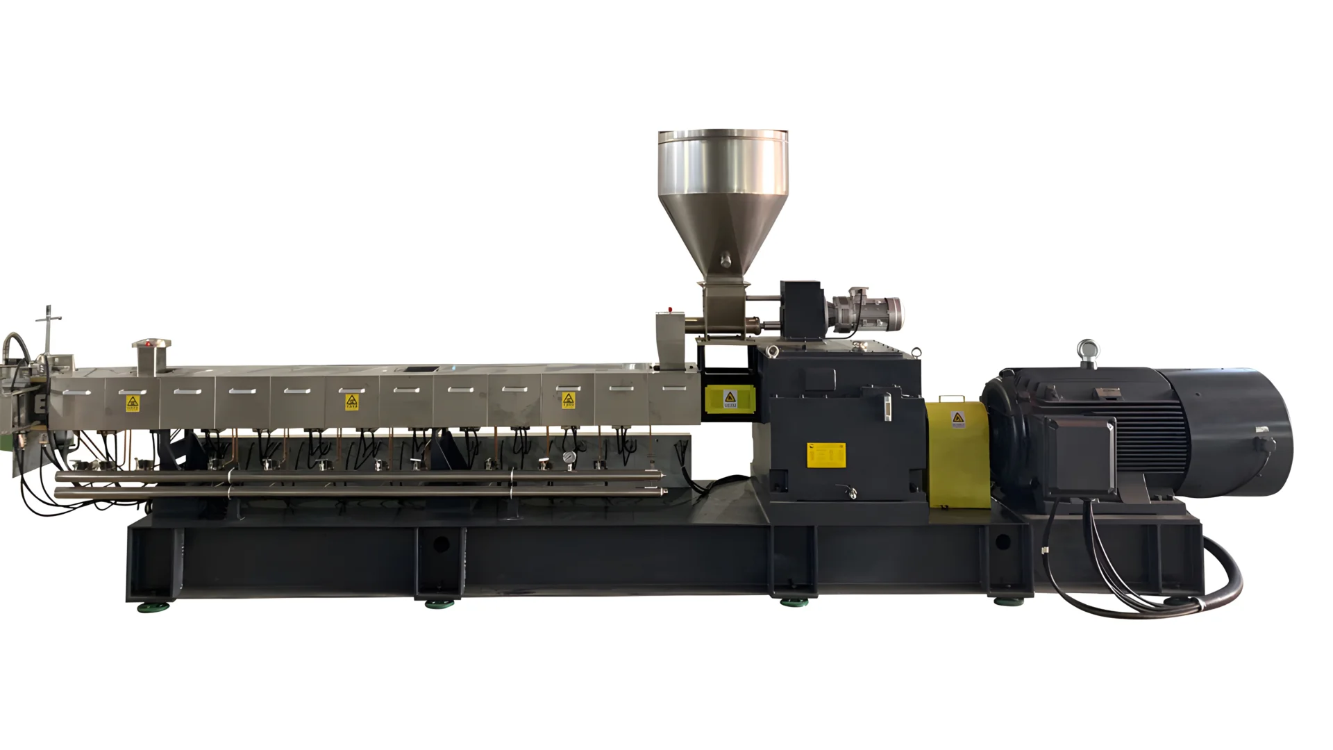 **Alt Text:** A high-performance co-rotating twin-screw extruder. The machine features a long, horizontal design with multiple heating zones, a large hopper for material feeding at the top, and a powerful motor at the end. The extruder is designed for efficient and consistent processing of various materials, making it ideal for industrial applications such as plastics compounding, blending, and recycling. The extruder's robust construction and advanced technology ensure high output and reliability.