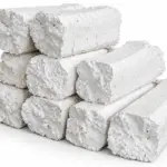 Stacked white EPS foam blocks formed by mechanical cold compaction