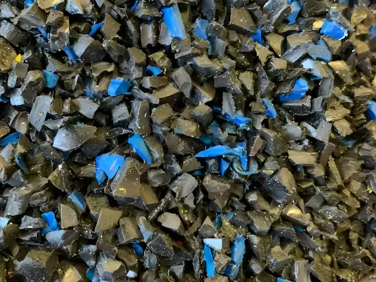 PVC regrind pieces prepared for rigid plastic washing operations